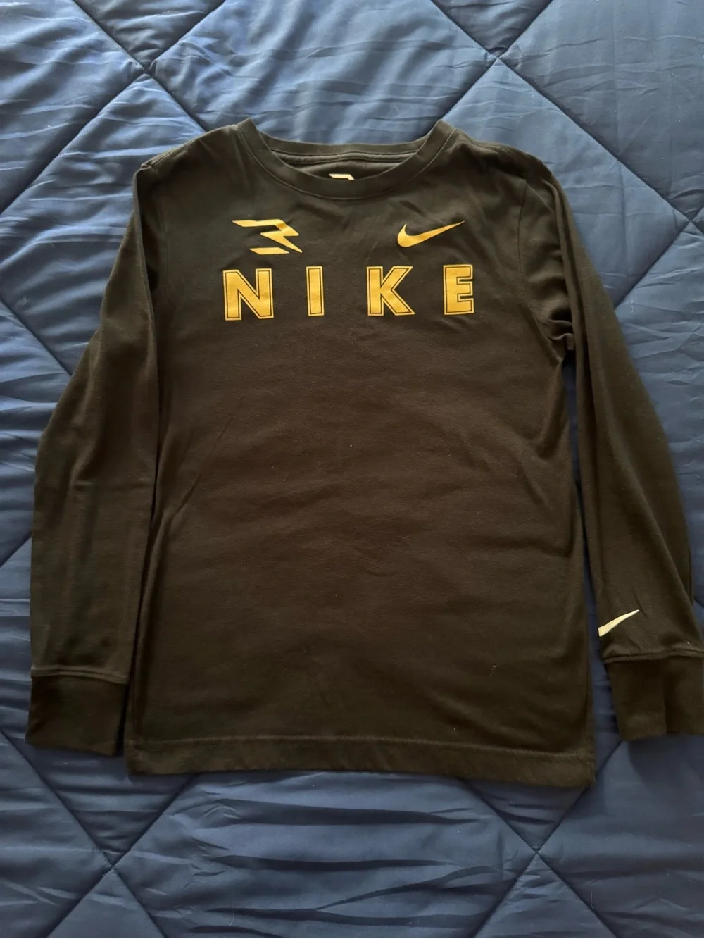 Nike Youth Black Long Sleeve Shirt with Gold Lettering